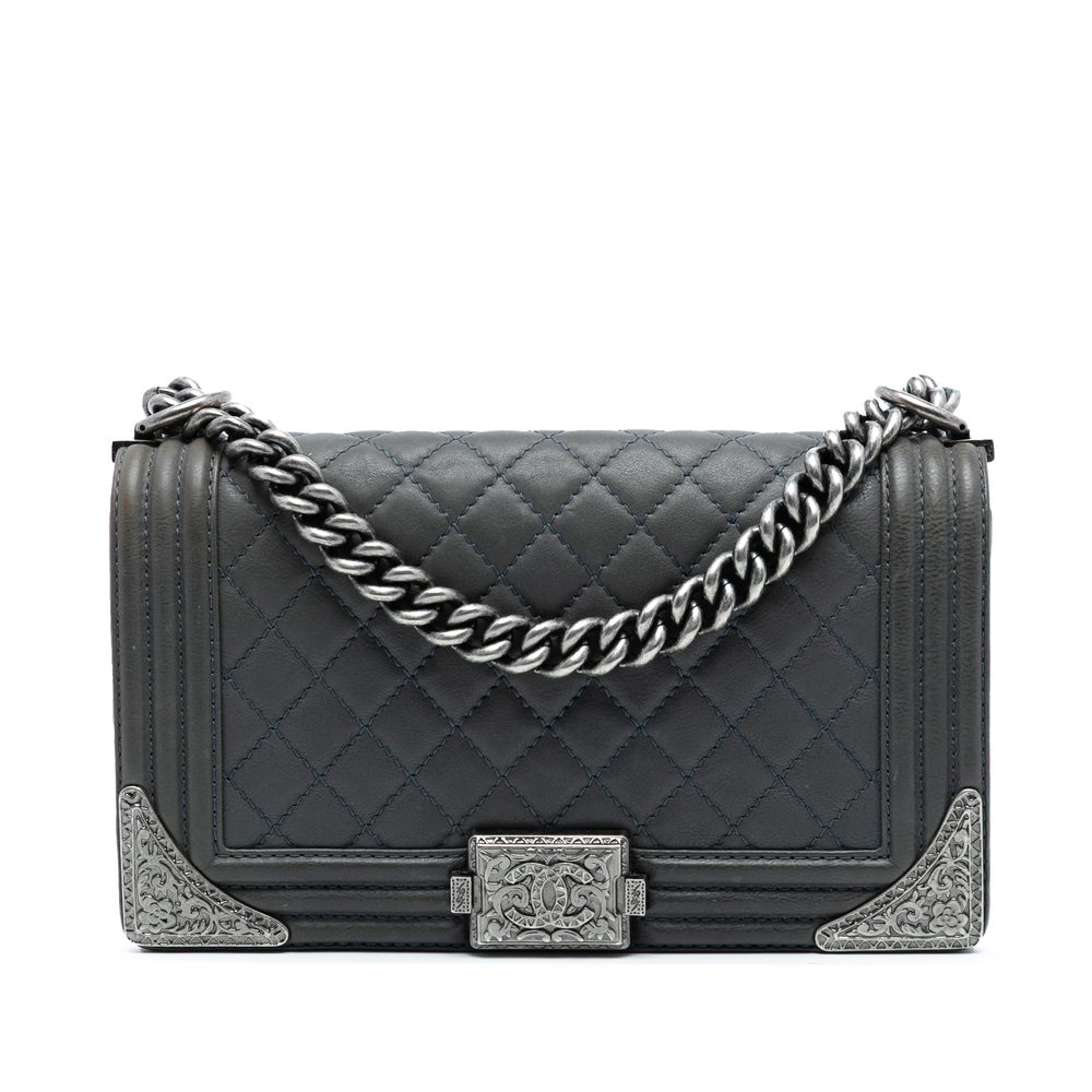 Pre-Loved Chanel Paris Dallas Old Medium Quilted Calfskin Cowboy Boy Flap